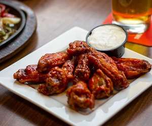 TUESDAY WING DAY! 1 LB OF WINGS FOR SEVEN BUCKS!! AND 6.50 STELLA DRAUGHT